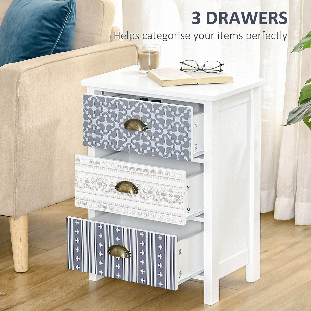 White nightstand with 3 open-front drawers, patterned panels, and antique brass cup pulls