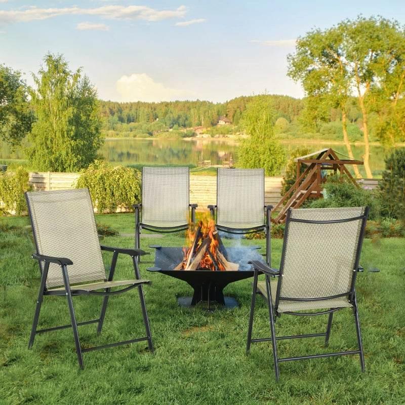 Set of four beige folding garden armchairs with black mesh back and armrests