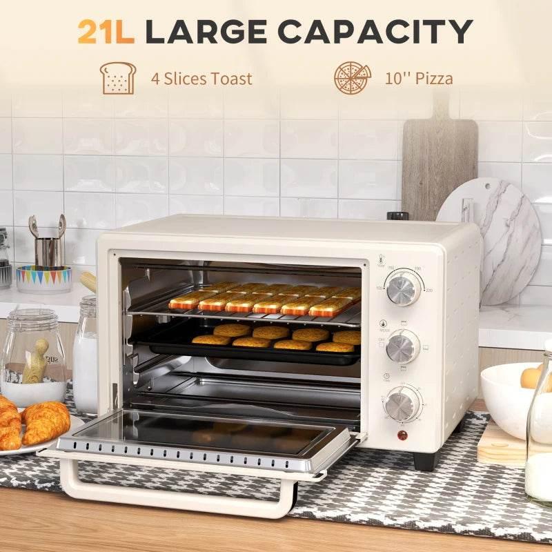 Cream mini electric oven with door open showing rack and multiple trays of food