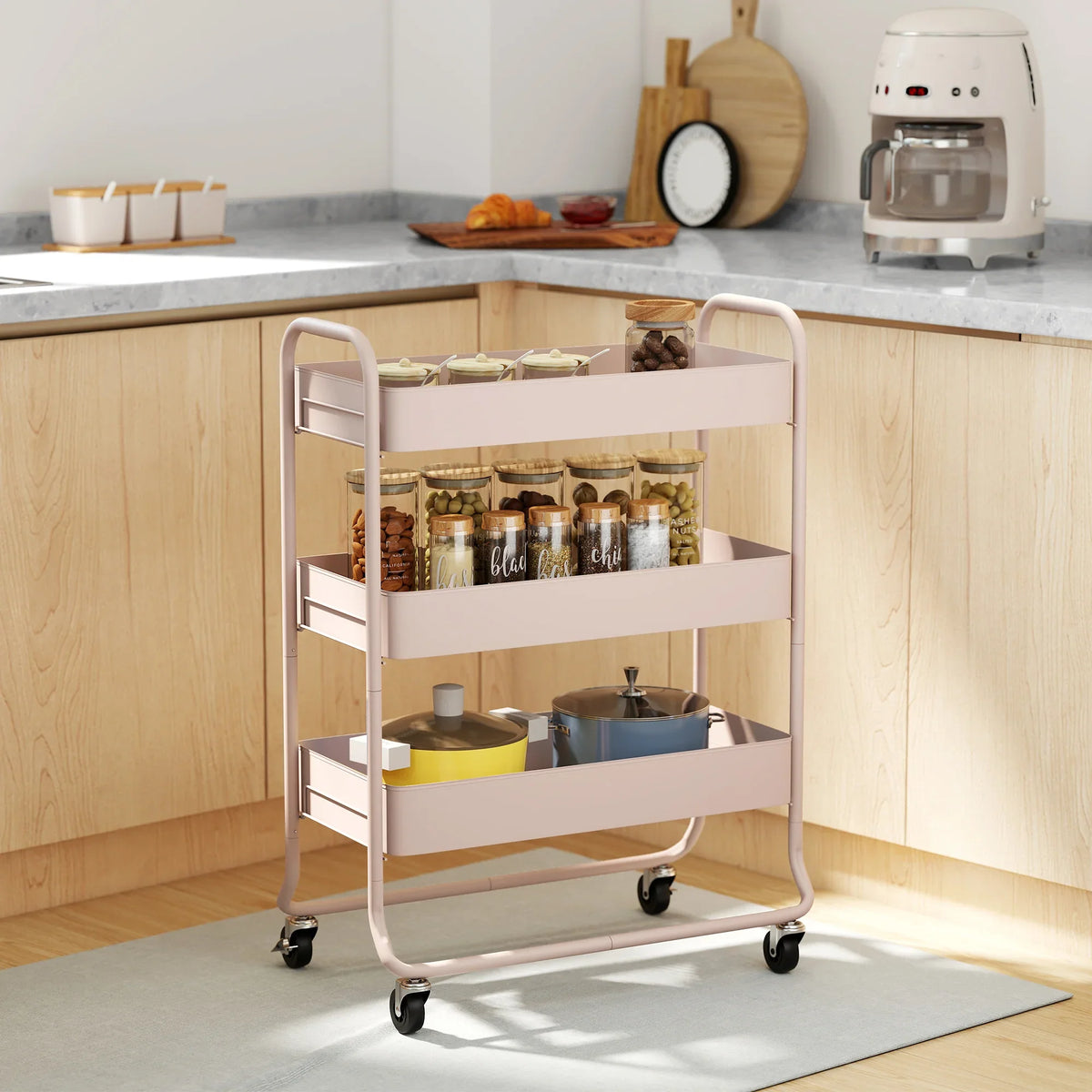 Light pink 3-tier storage trolley with mesh baskets and caster wheels for home organization