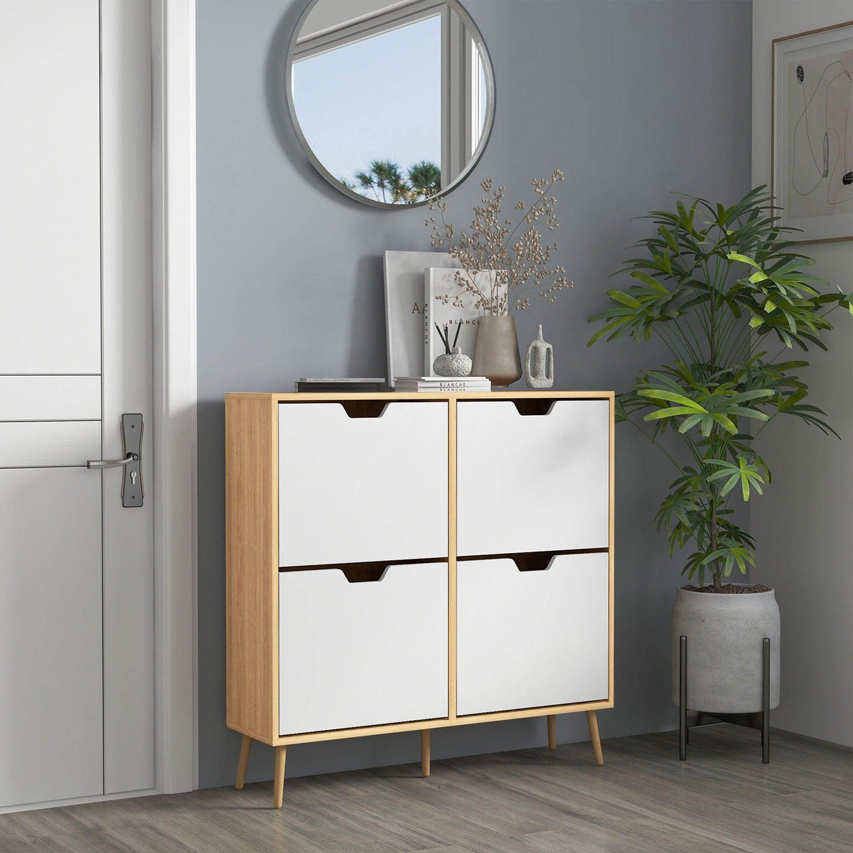 Natural wood shoe cabinet with four white flip drawers, mid-century style stand