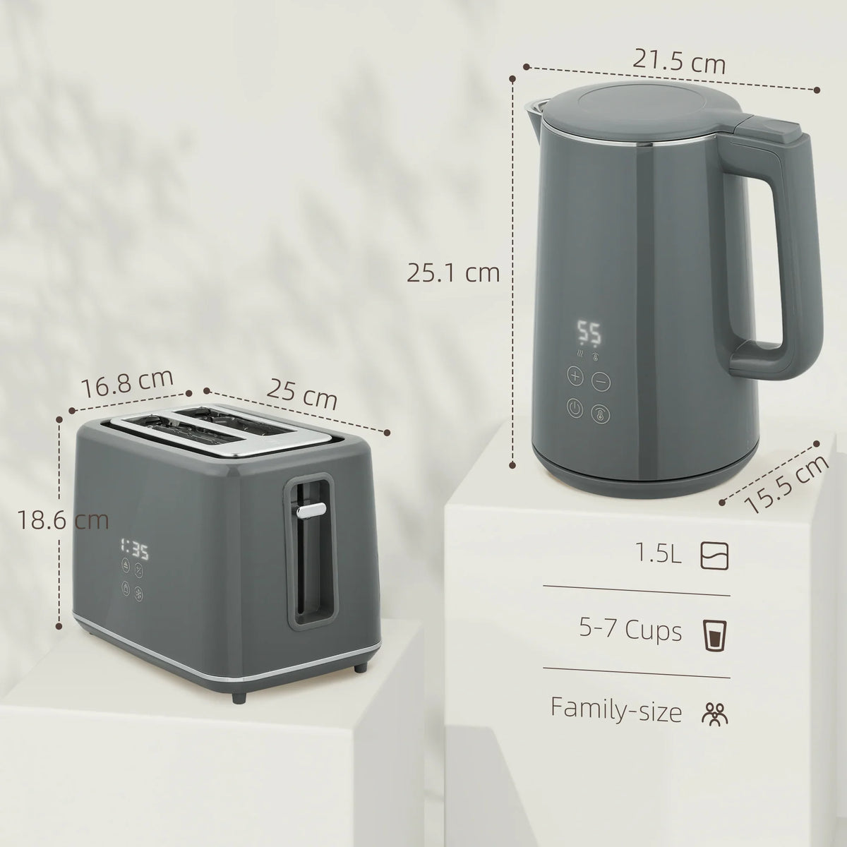 Grey electric kettle and toaster with size diagram on product box
