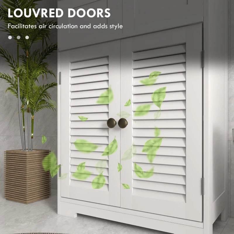 White louvered cabinet doors with two round knobs on bathroom storage unit