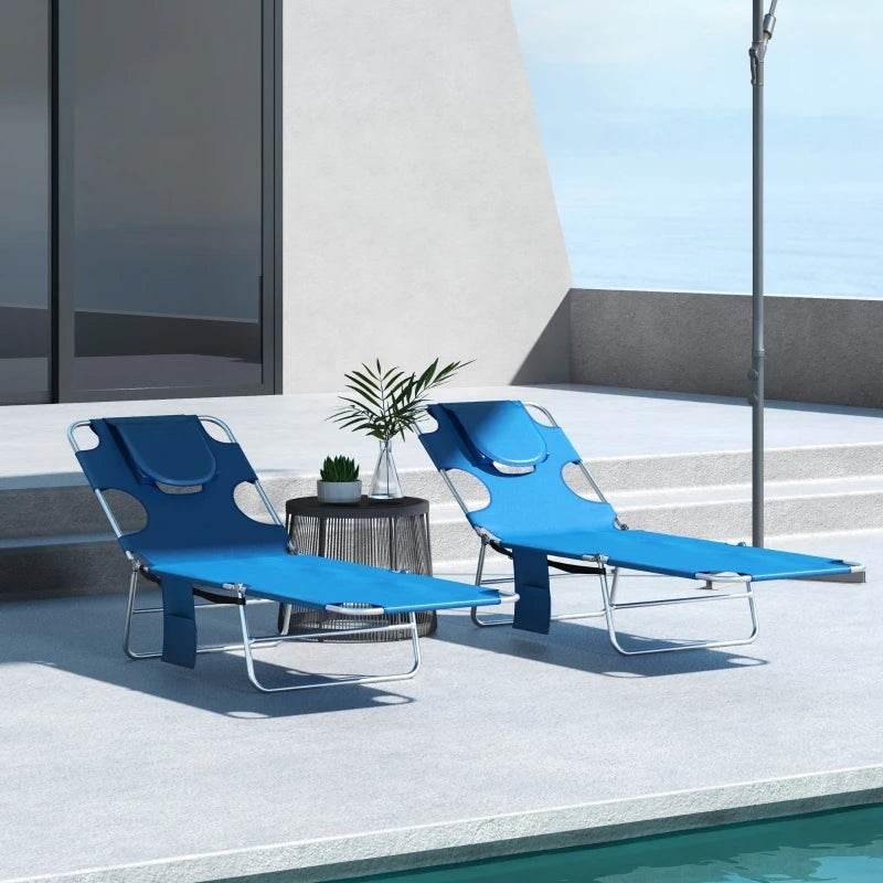 Set of 2 foldable blue sun loungers with adjustable recline positions and curved headrests