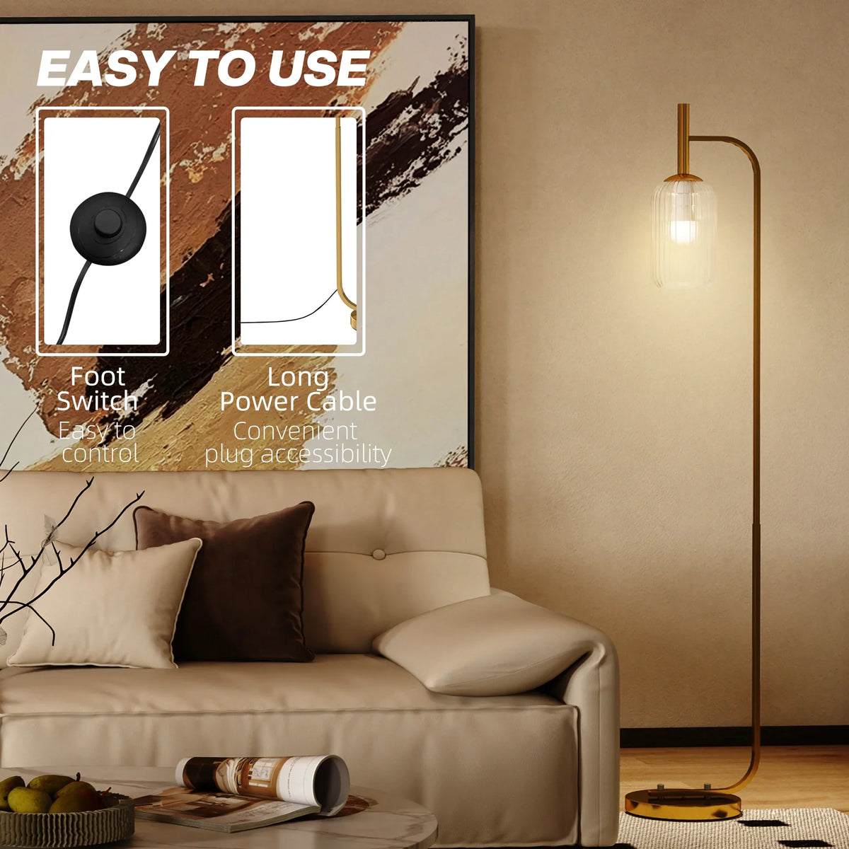 Gold LED floor lamp with clear glass shade and round foot switch on base