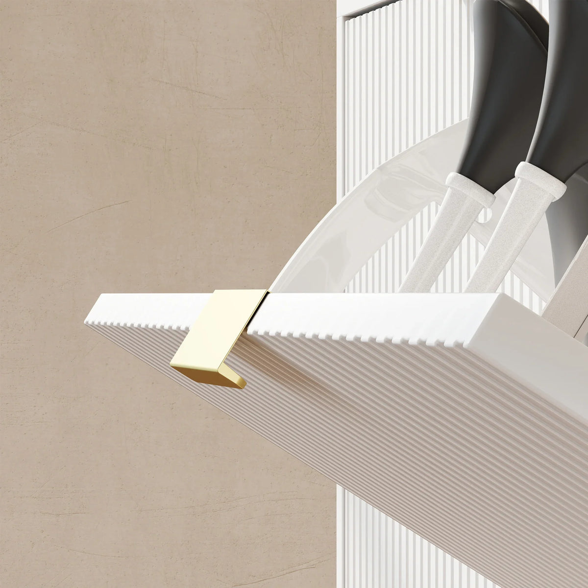 White shoe cabinet open flip shelf with ridged back and gold support bracket.