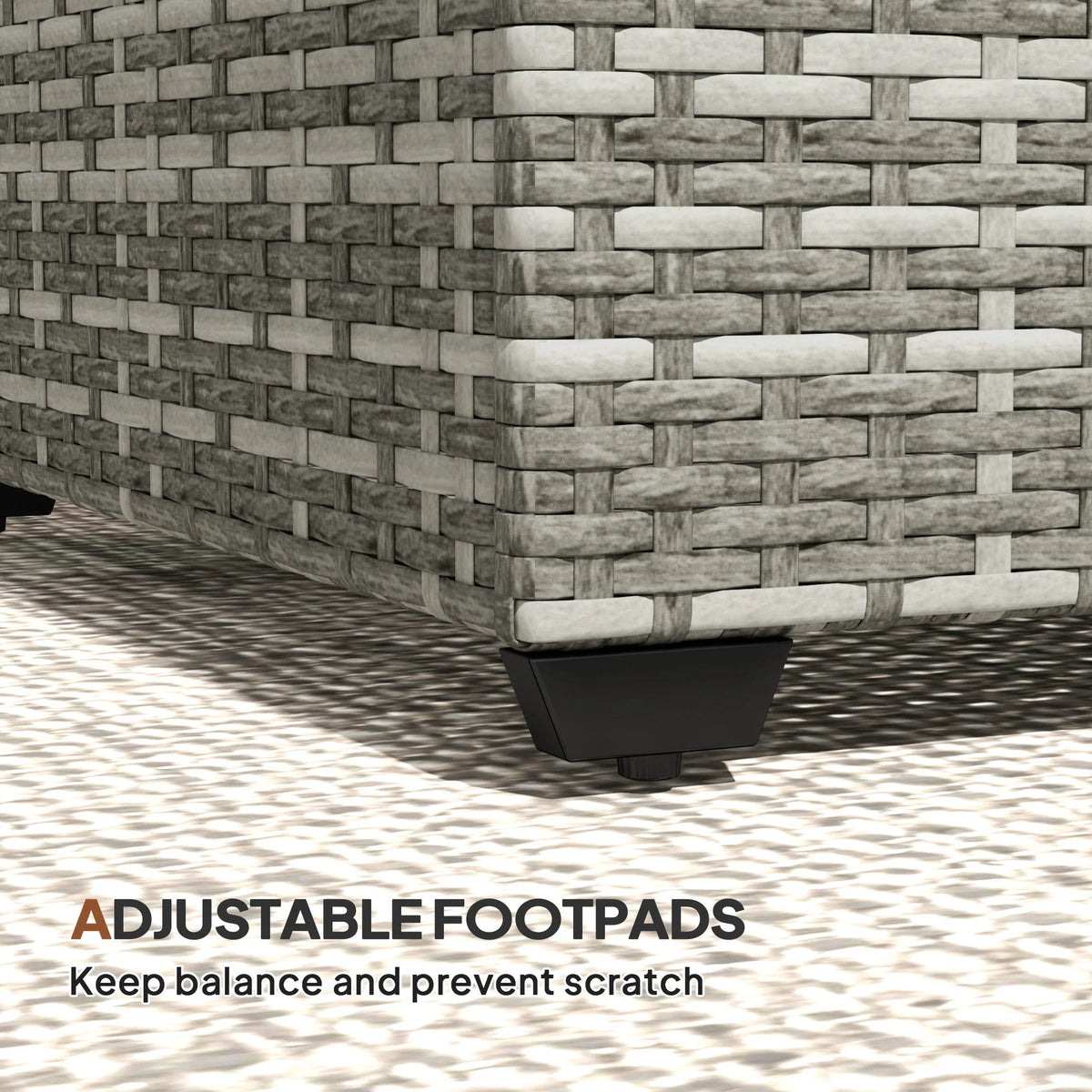 Light grey woven rattan side table corner with adjustable footpad for scratch protection