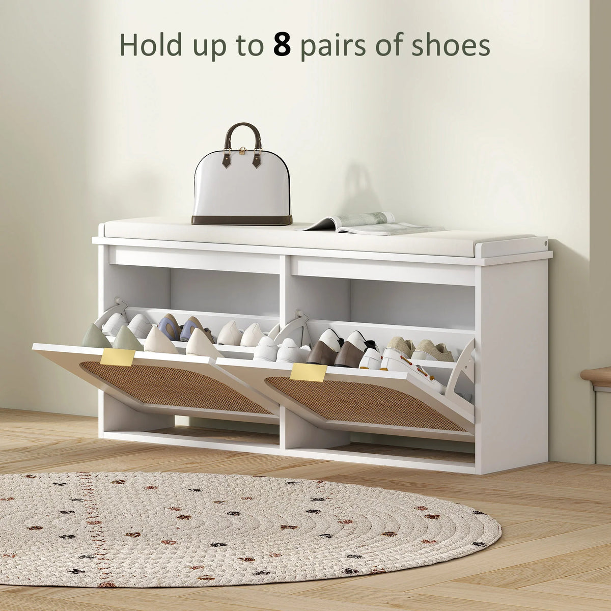 White shoe bench with open shoe compartments and two flip drawers; padded top storage