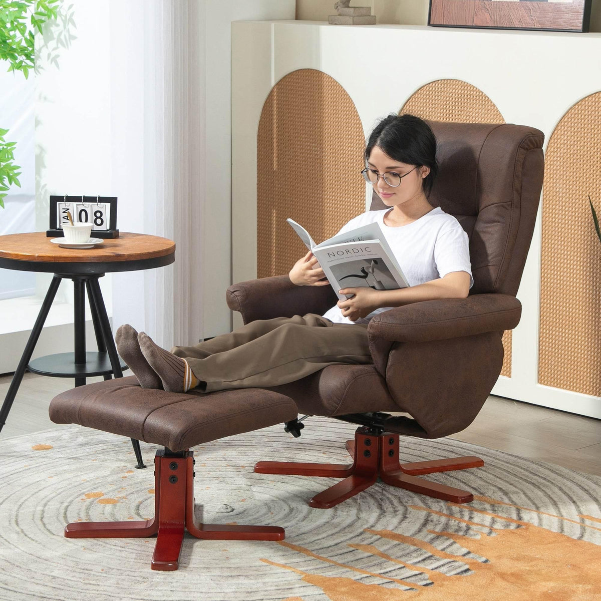 Dark brown faux leather recliner chair with matching footrest, reclined for lounging
