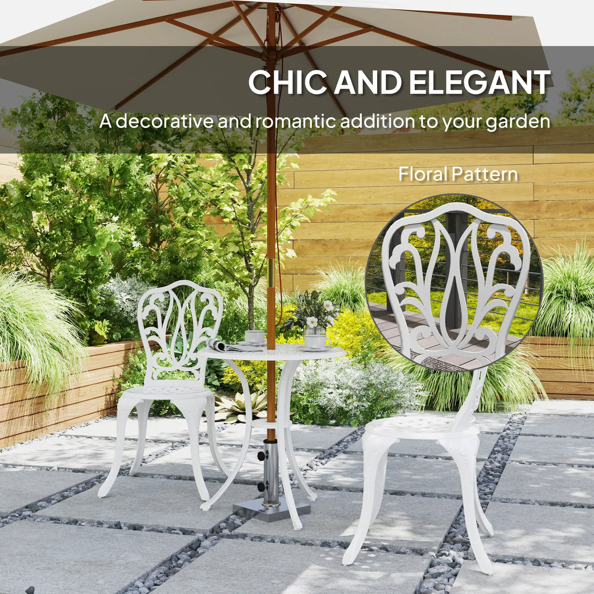 White ornate cast-aluminum bistro chair and round table under umbrella