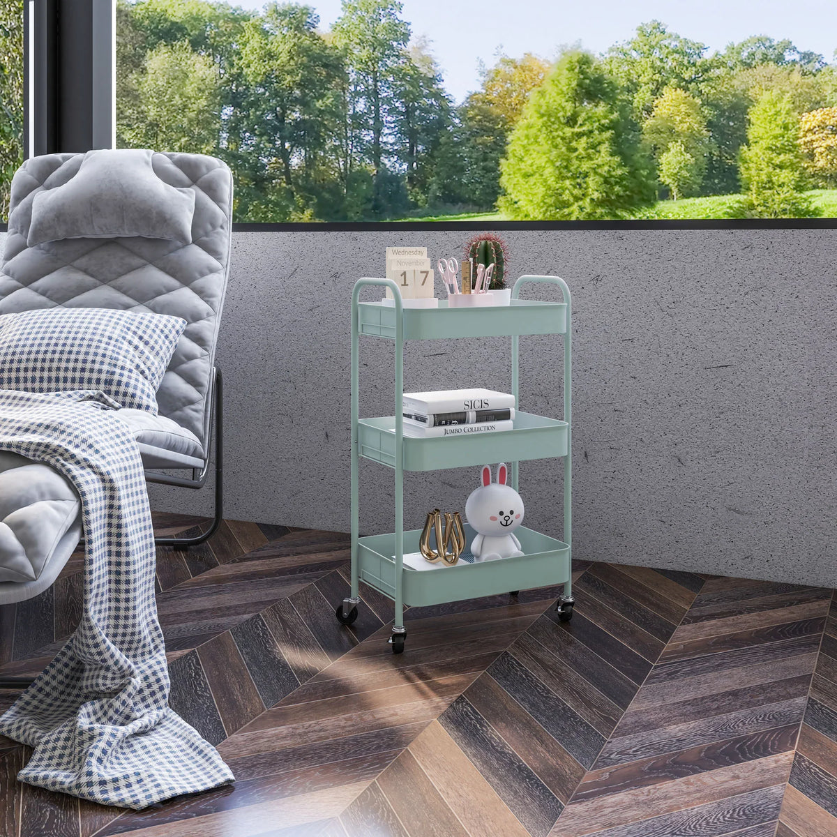 Light blue three-tier rolling storage trolley with open shelves and caster wheels