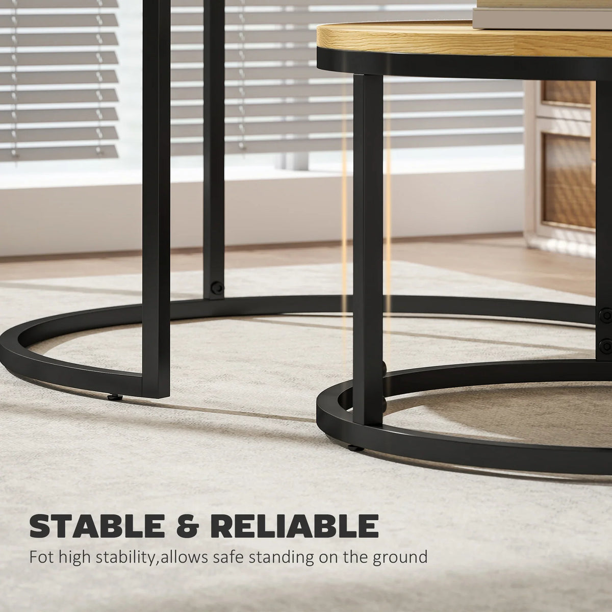 Black metal nesting side table legs with non-marking foot pads, natural round top
