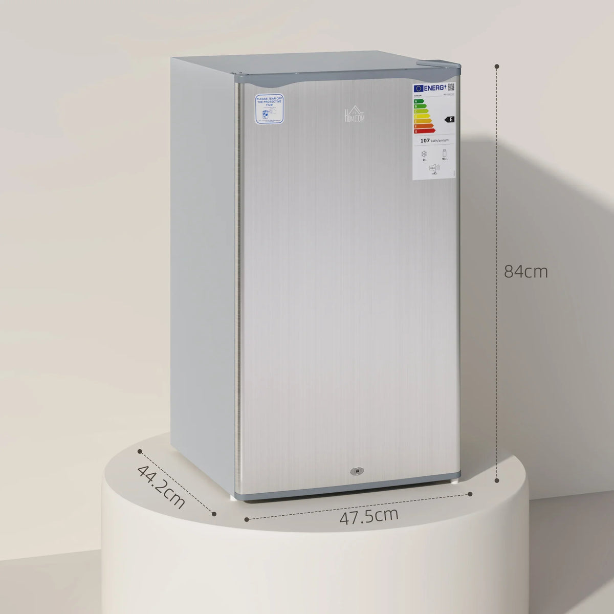 Compact grey under-counter fridge viewed from the side with open-top measurements
