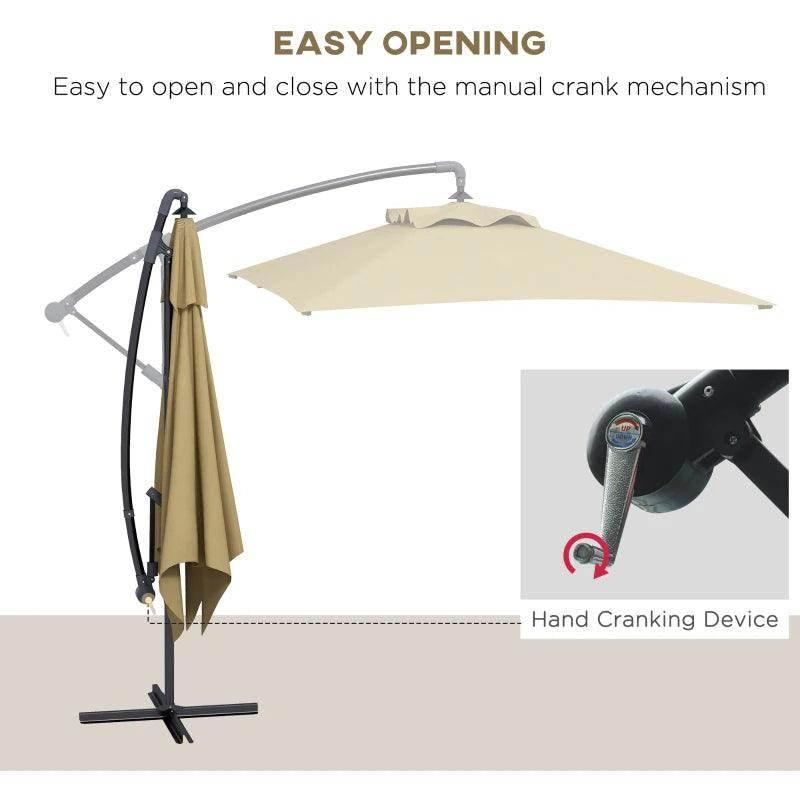 Cantilever patio parasol with tan canopy and manual crank opening mechanism