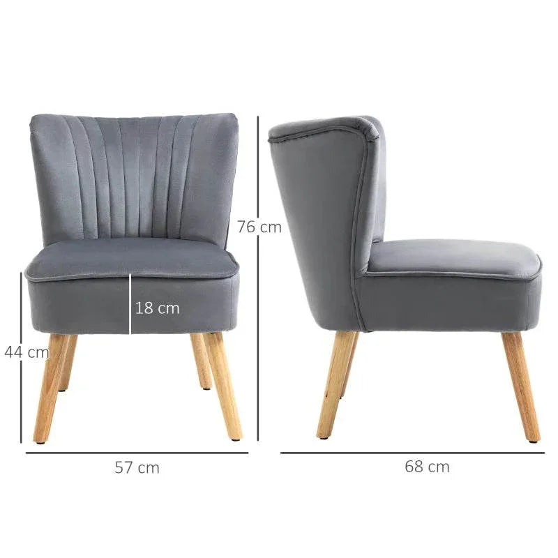 Grey velvet accent chair with curved back, channel tufting, and wood legs (side view)