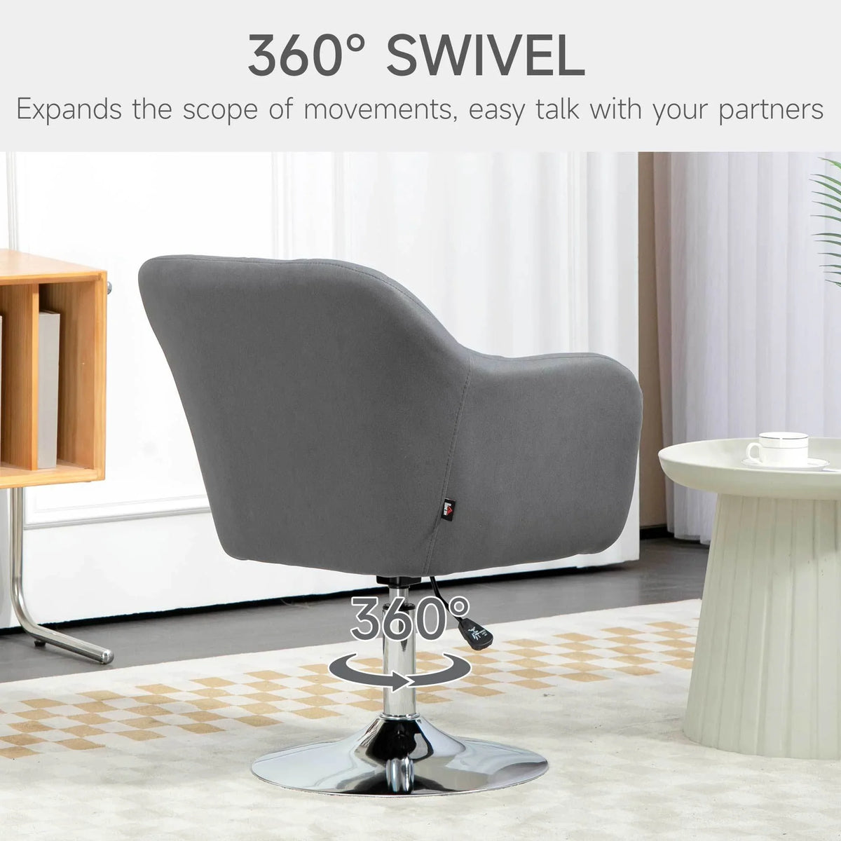 Grey accent armchair with 360° swivel base and curved backrest