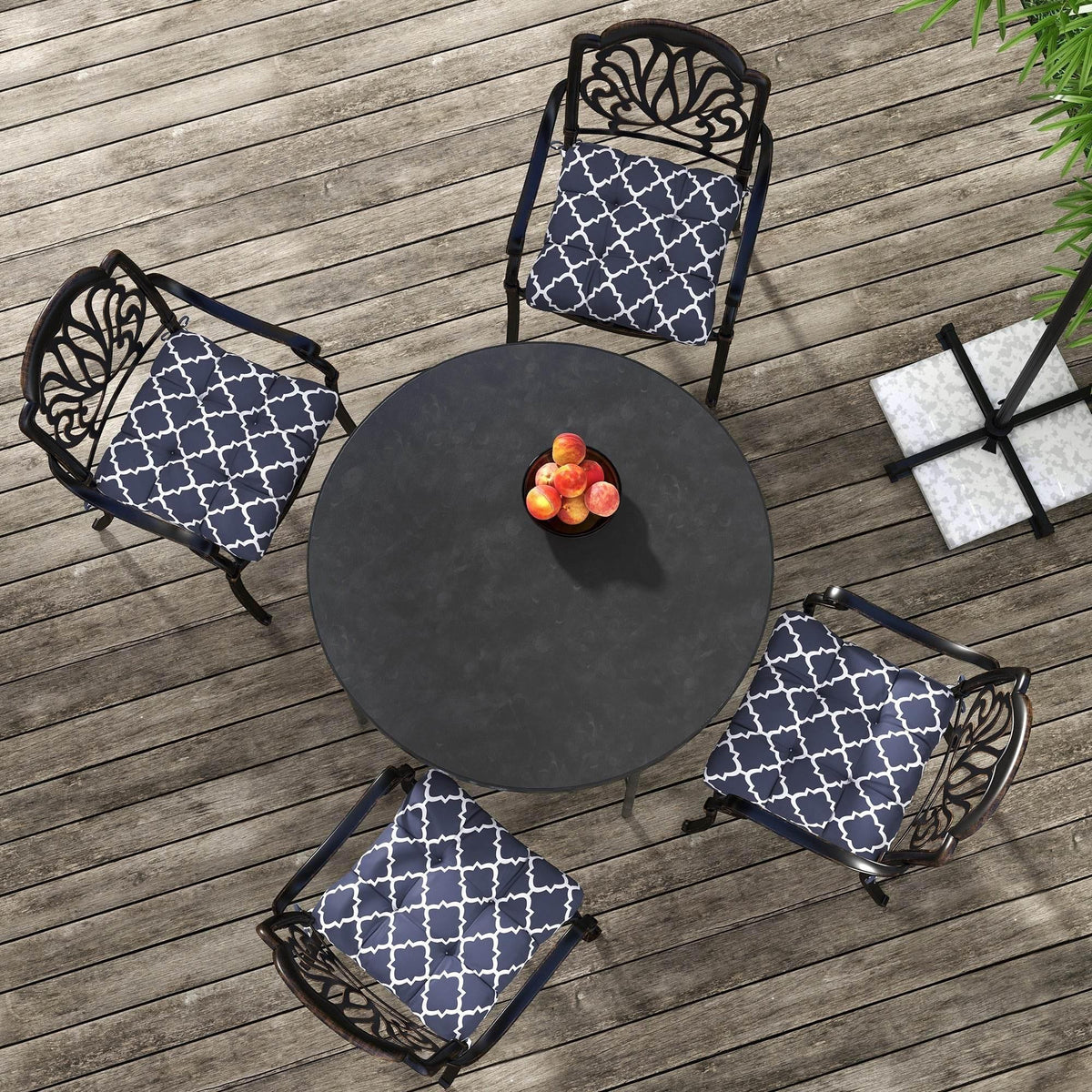 Navy blue patio seat and back cushions with white lattice print and corner ties