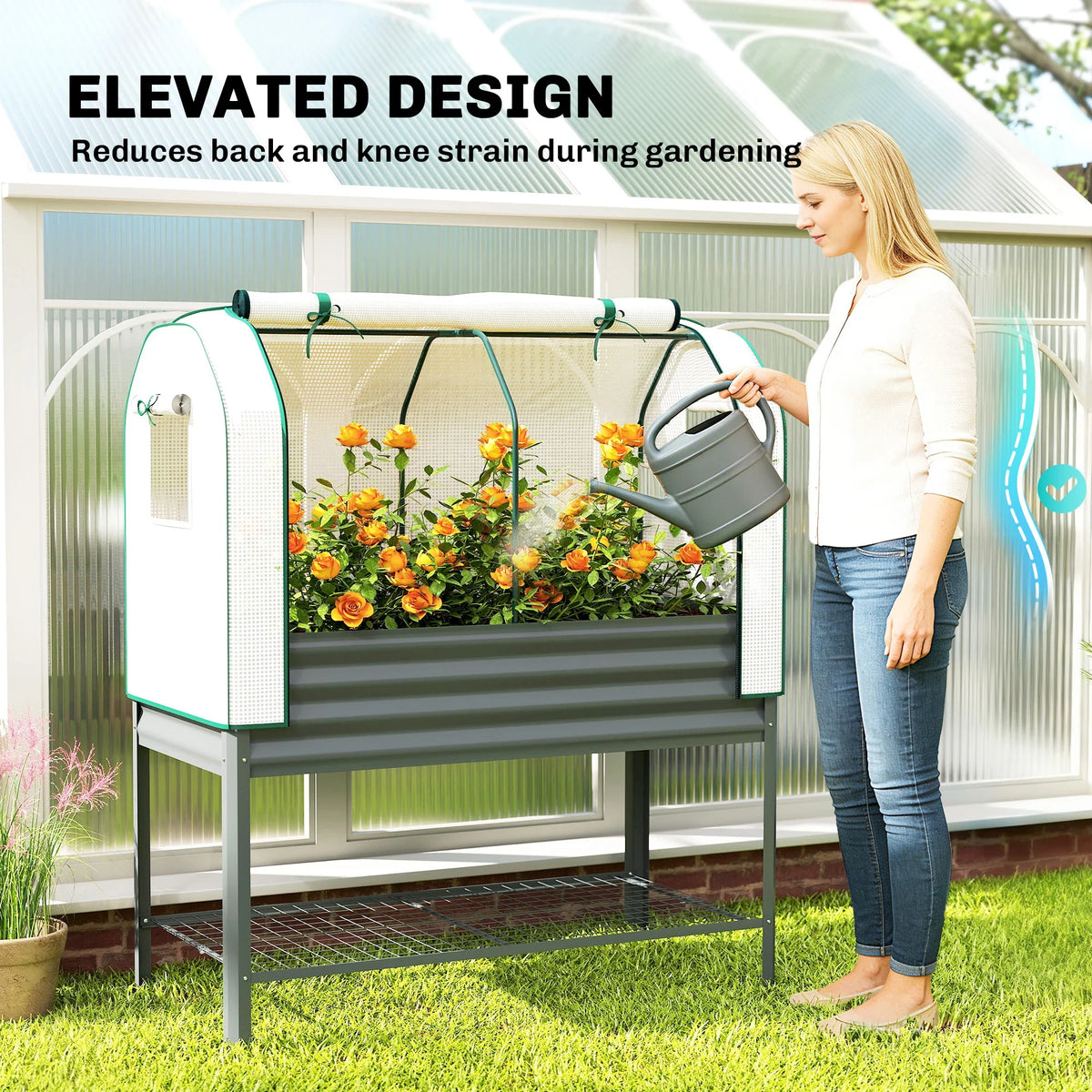 Raised greenhouse planter with bottom shelf and person watering inside