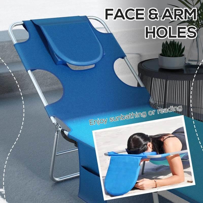 Blue sun lounger with face-and-arm openings, side pocket, and curved headrest on frame