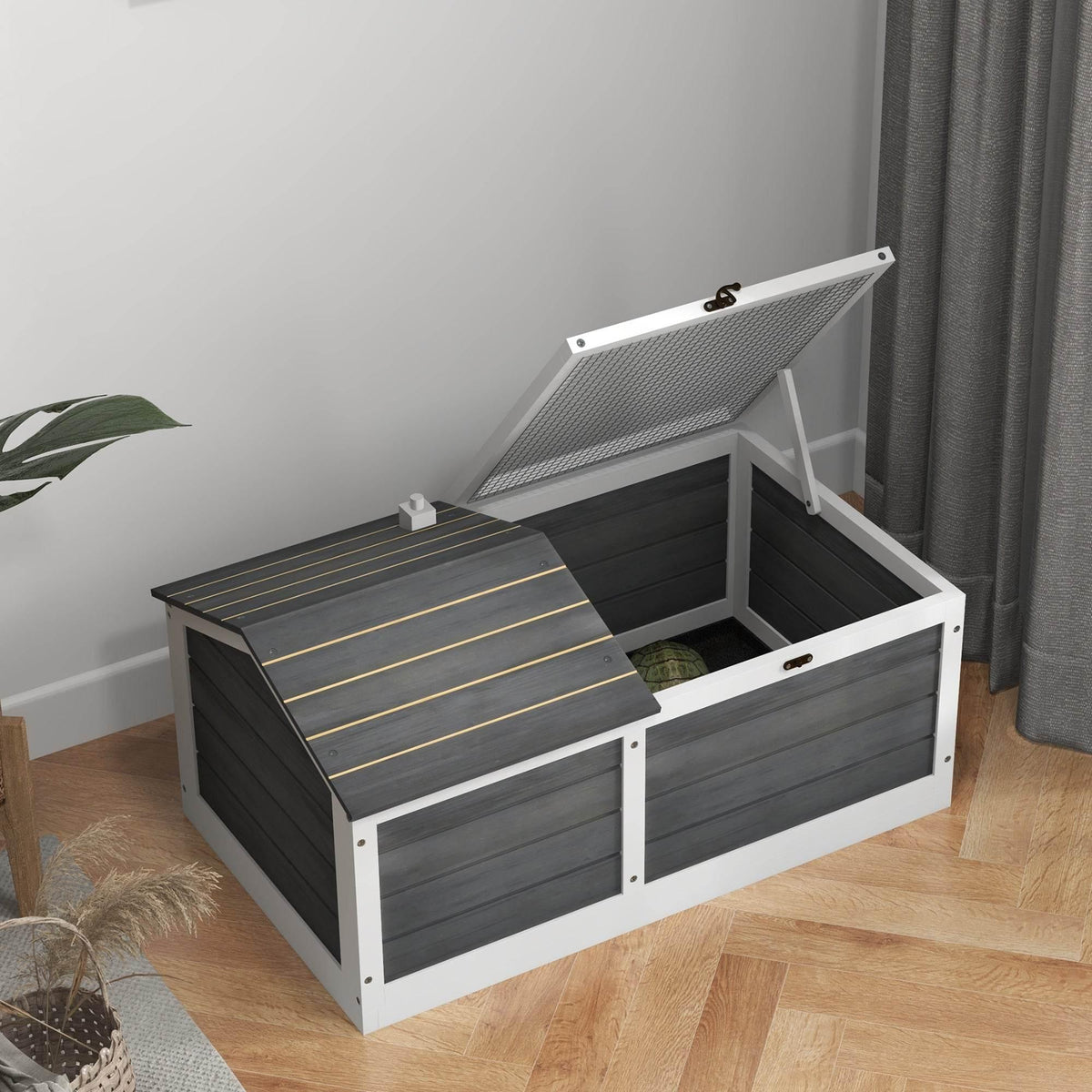 Wooden tortoise enclosure with raised basking lid and open front compartment
