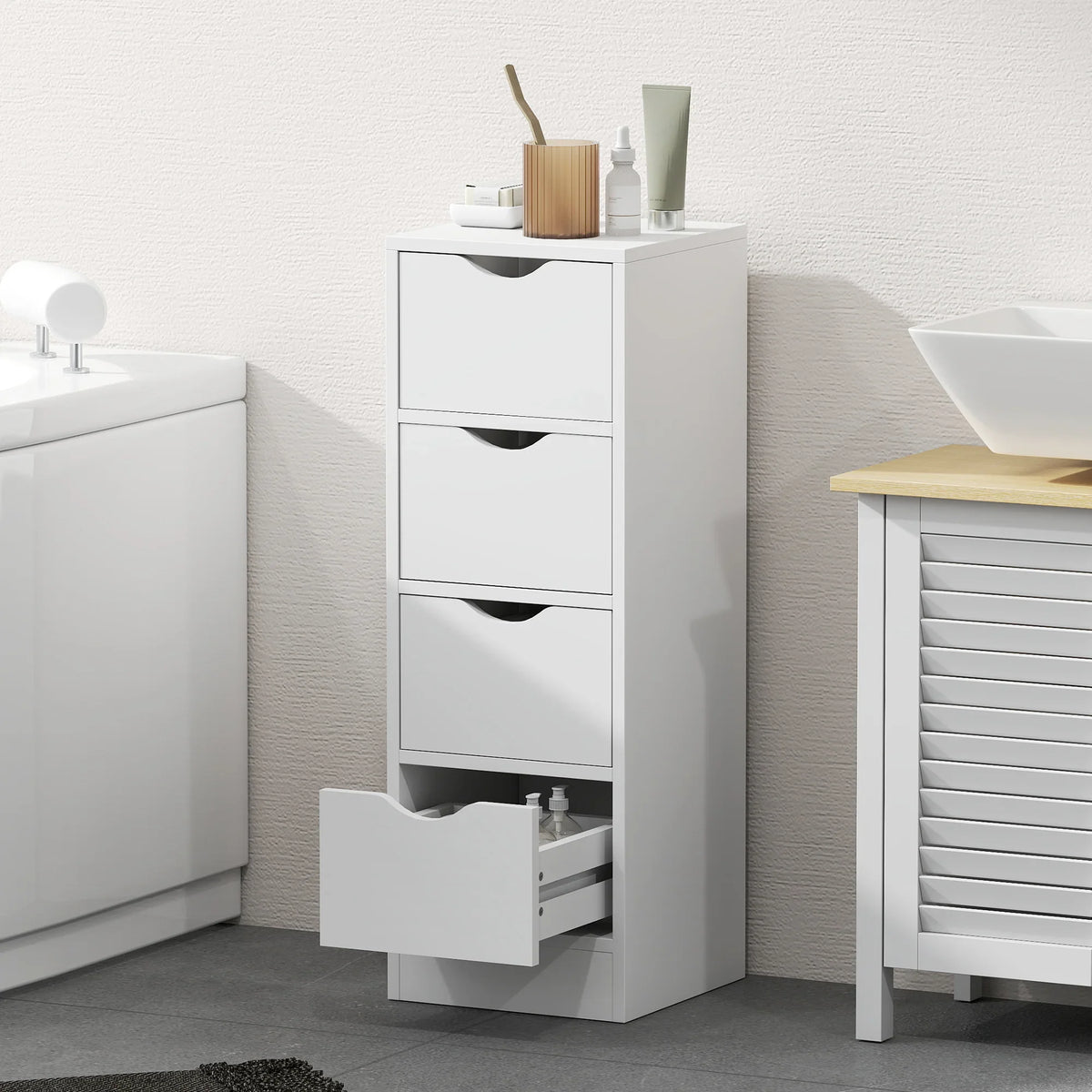 White bathroom storage cabinet with four drawers and a small open bottom drawer