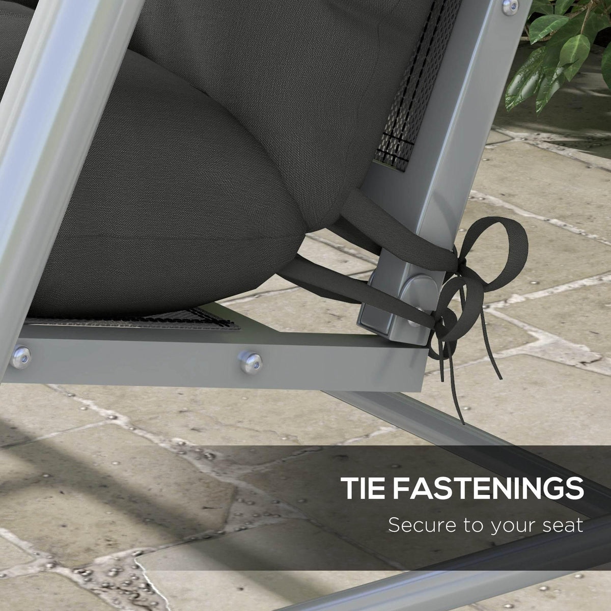 Dark grey patio swing cushion with tied fastening straps under the seat