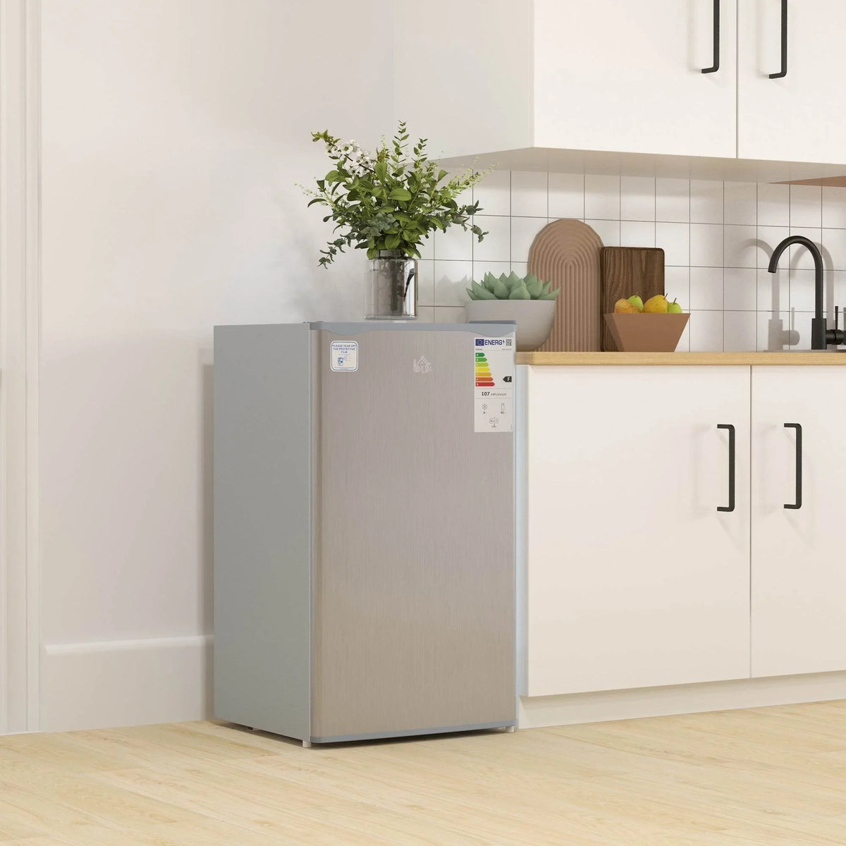 Under-counter gray refrigerator with dual doors and integrated handles