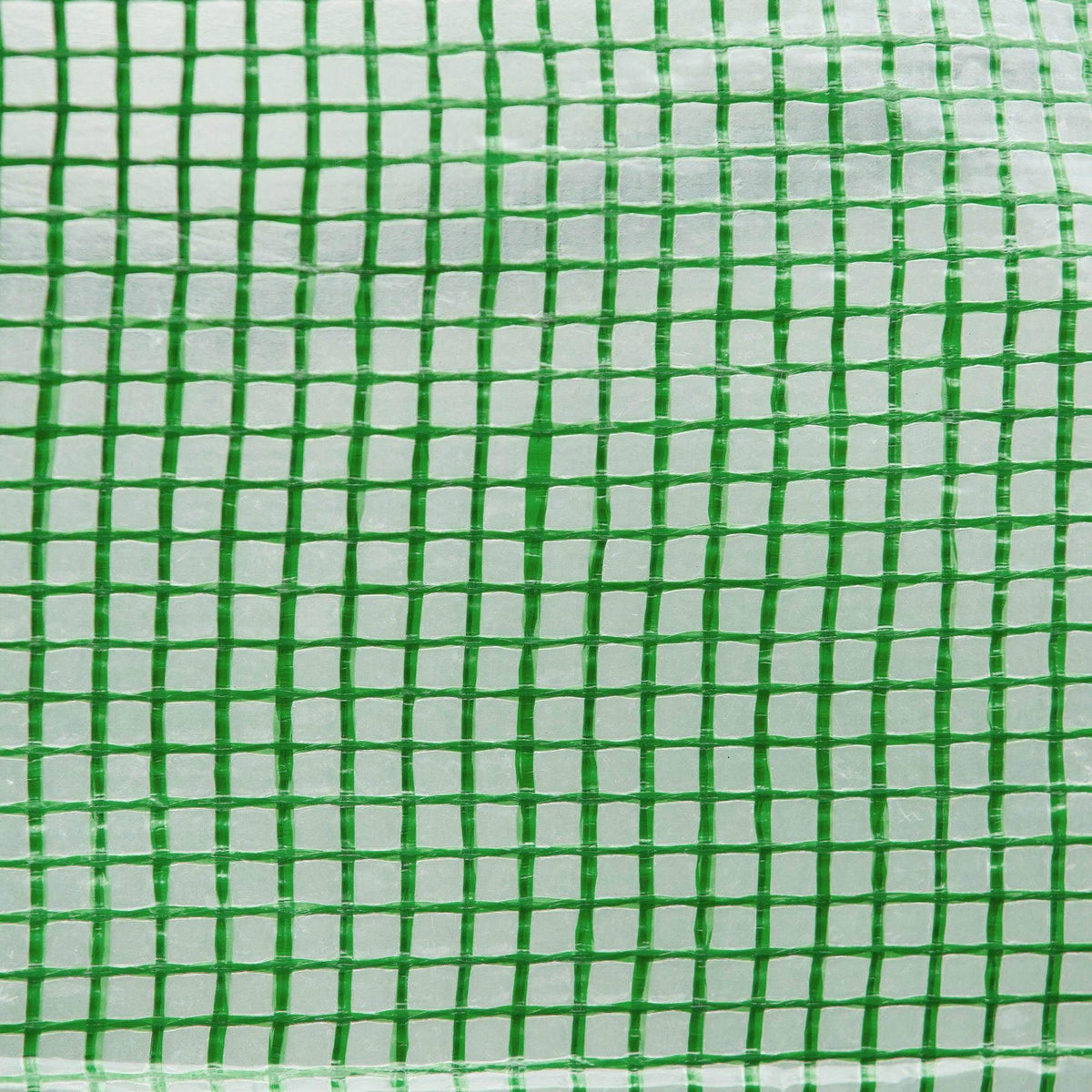Close-up of green polyethylene greenhouse mesh fabric with grid pattern