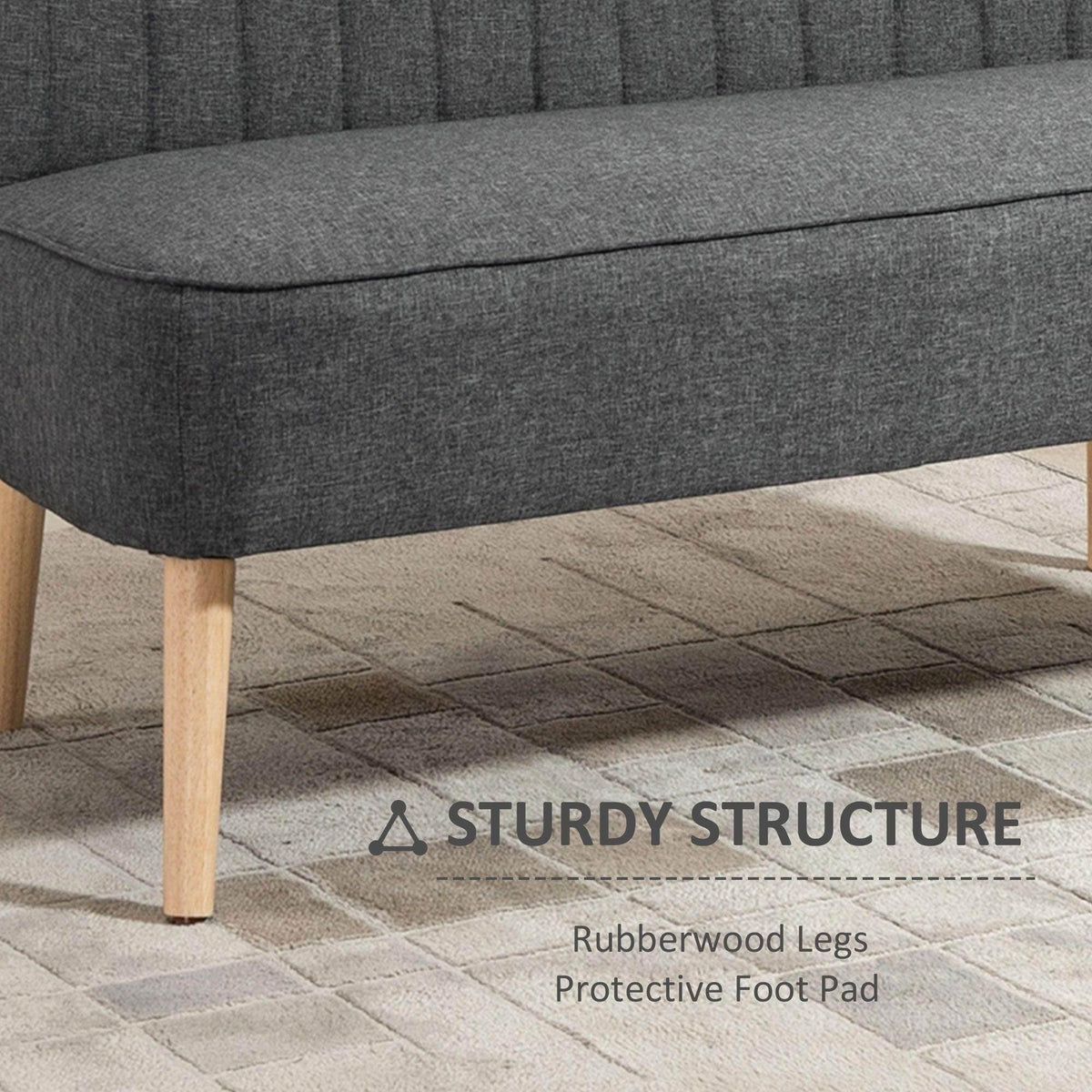 Grey sofa base with light wood legs and protective foot pads