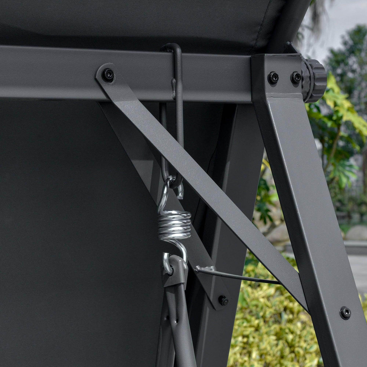 Grey swing bench corner showing hanging strap and spring hook hardware
