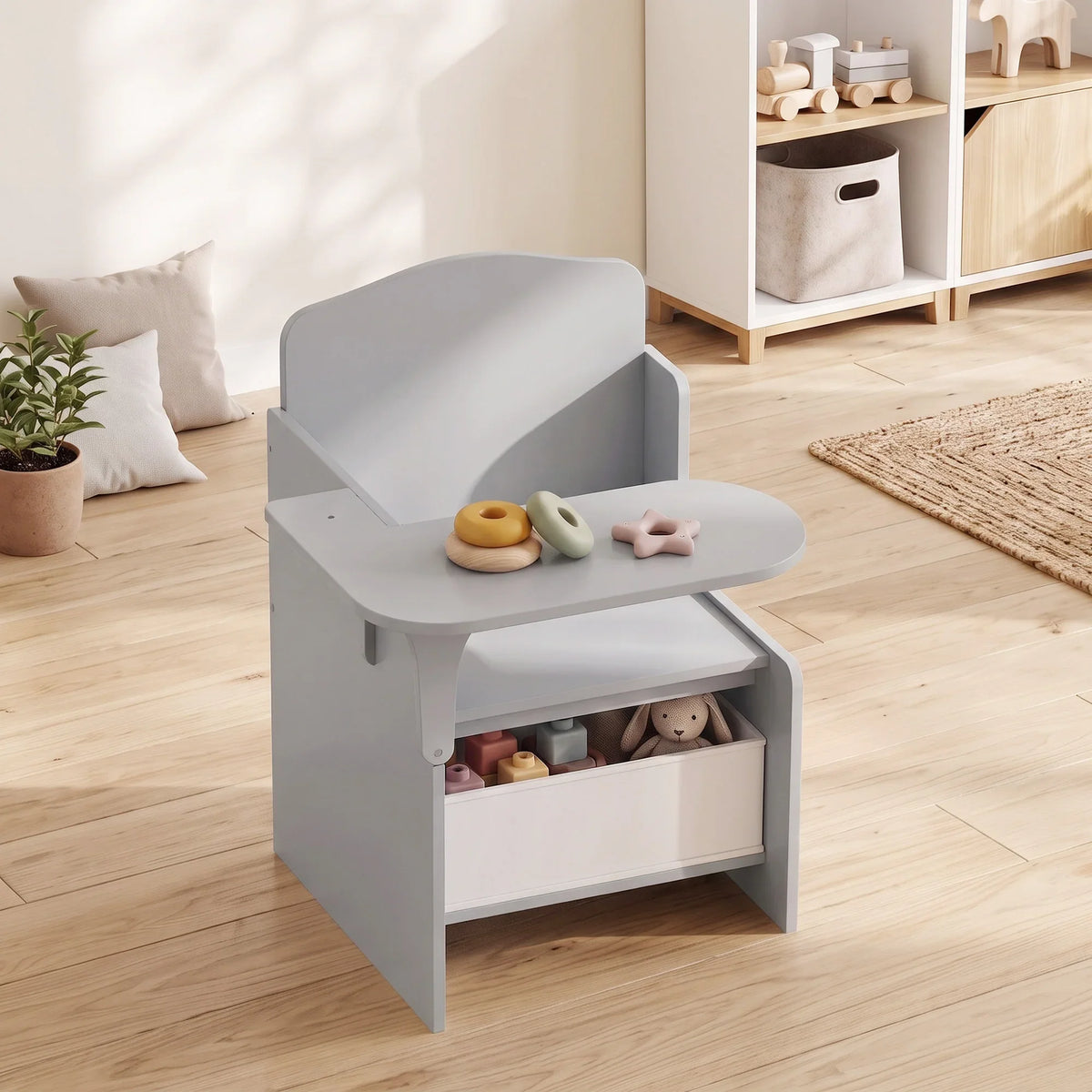 Kids table and chair set with gray chair and open storage drawer for toys