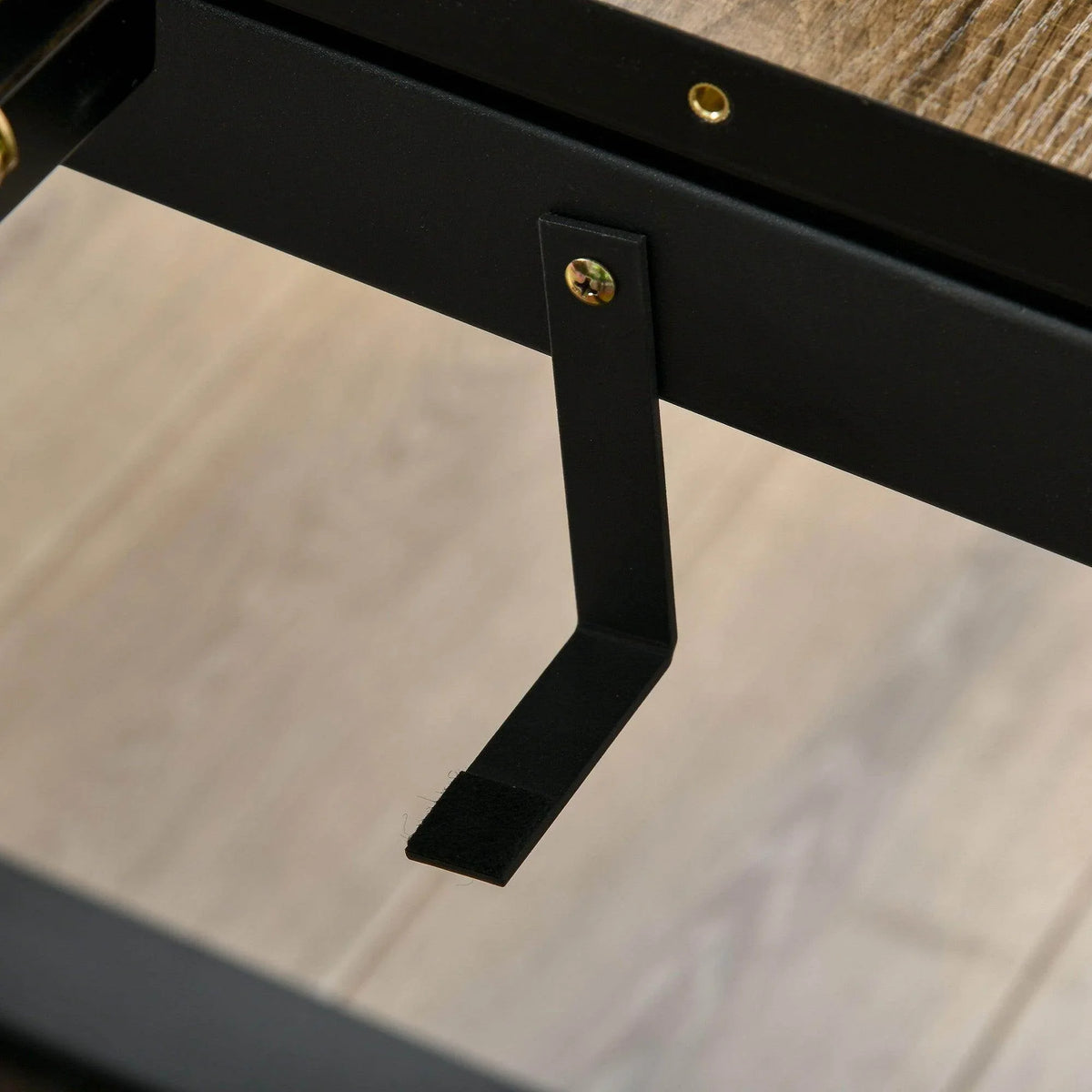 Extendable dining table corner bracket with black leg and gold screw detail