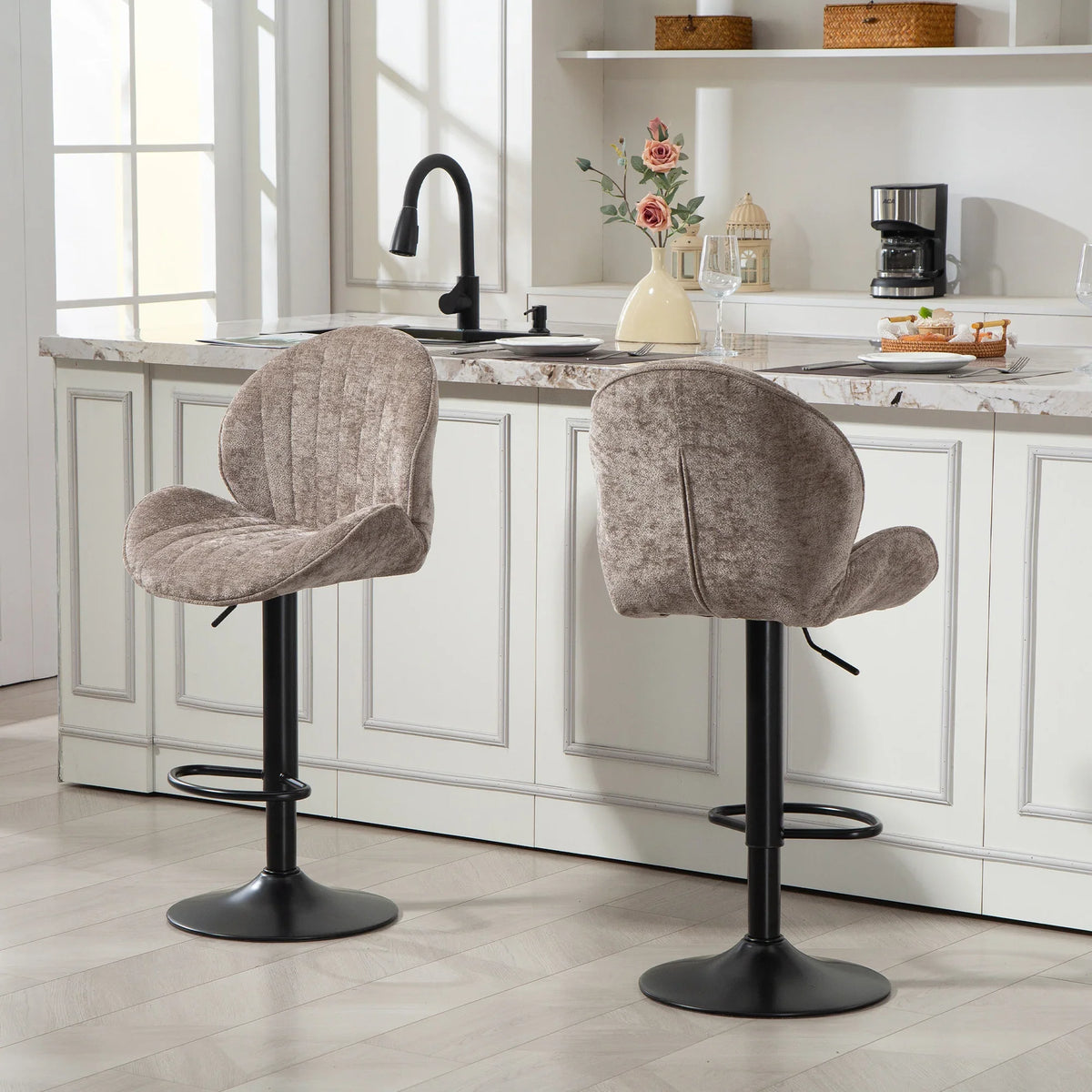 Set of 2 brown swivel bar stools with backrest, gas lift, and round footrest
