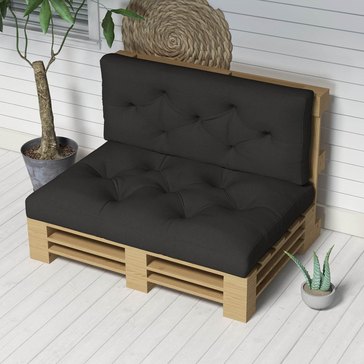 Charcoal grey outdoor pallet seat cushion and back pillow set on wooden frame, tufted