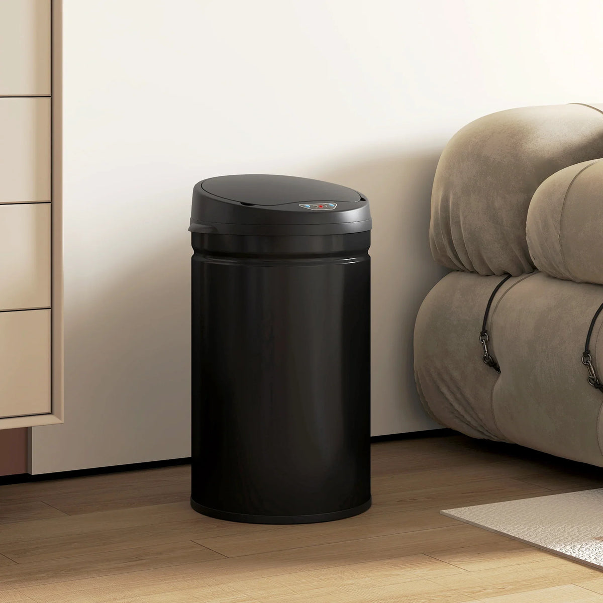 Black automatic sensor trash can with round closed lid and stainless steel body