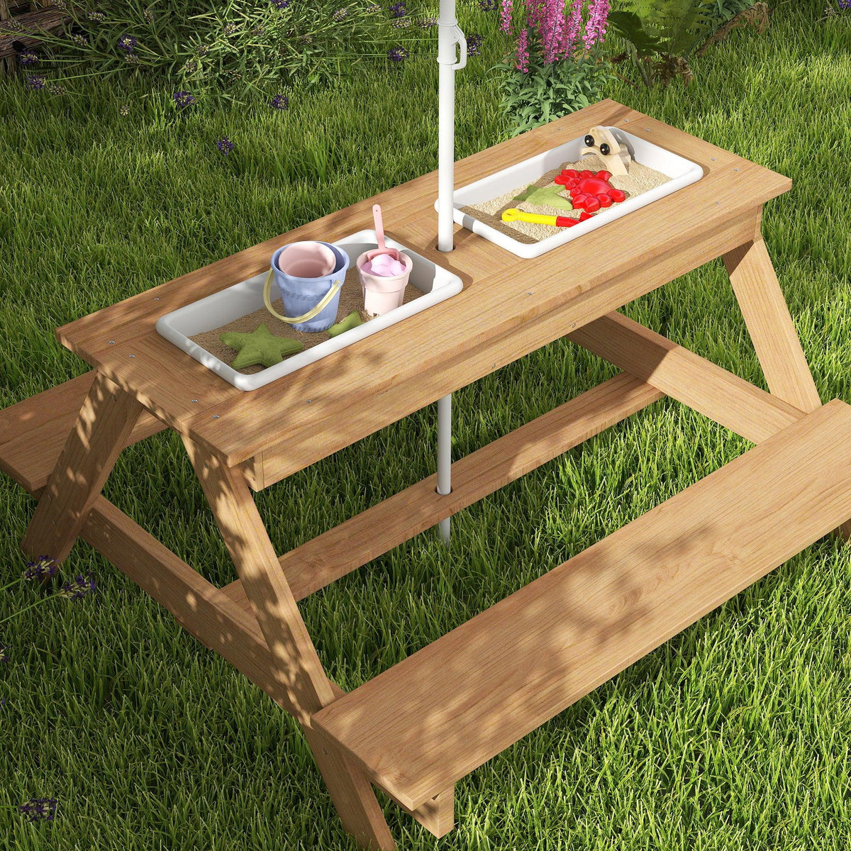 Kids picnic table with sand and water bins, cups and small toys on top trays