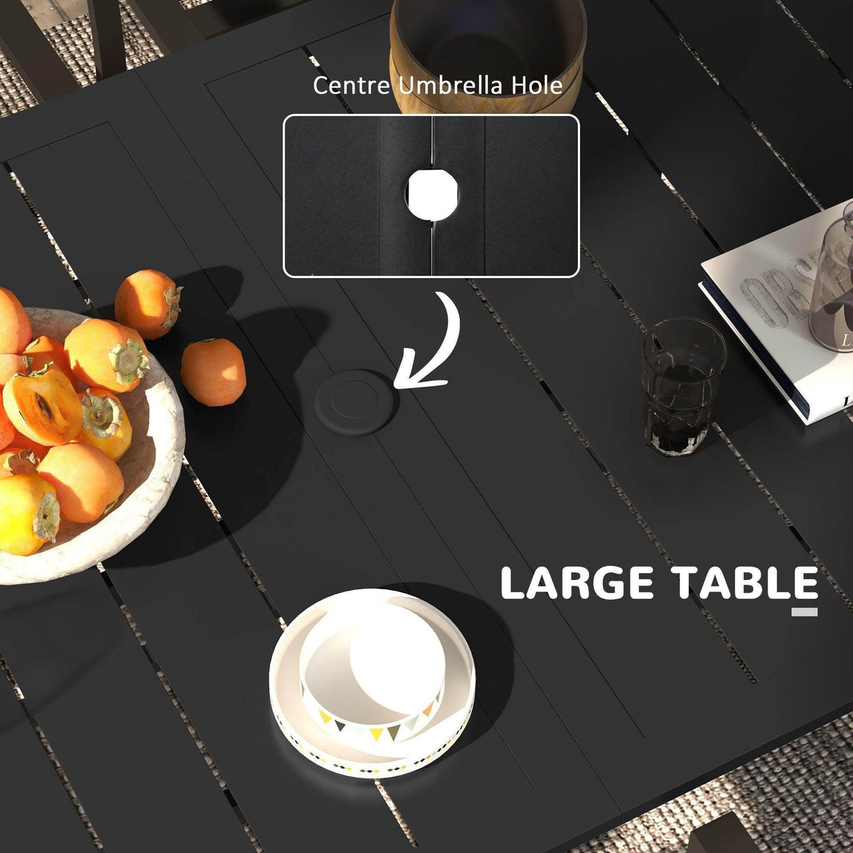 Black tabletop showing centre umbrella hole for the large outdoor dining table.