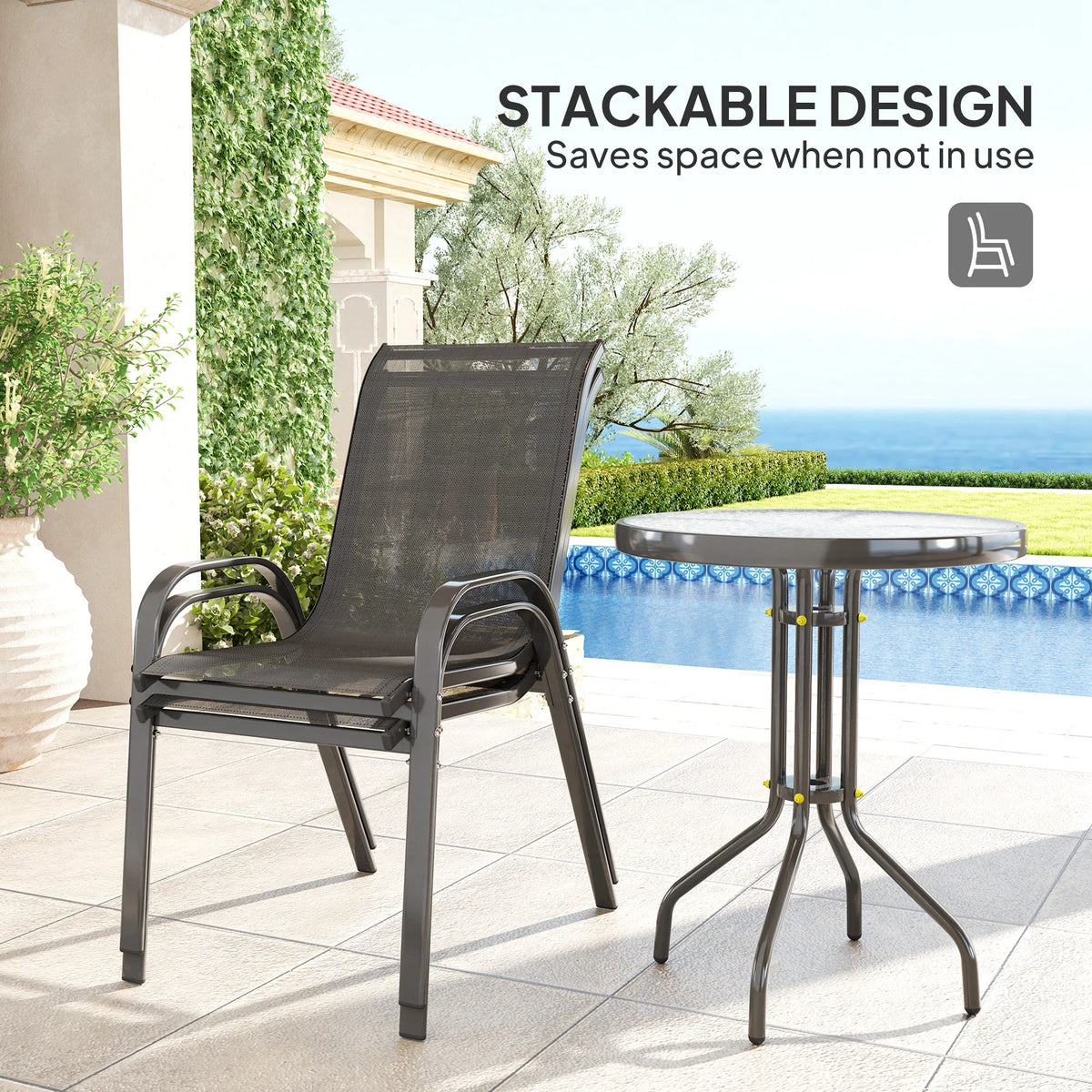 Stackable dark mesh chair beside round metal bistro table on outdoor deck