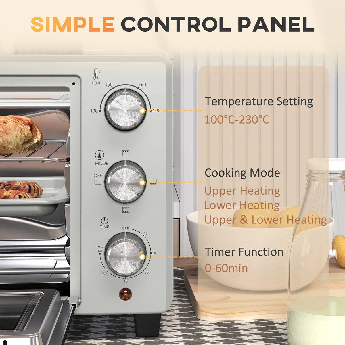 Silver oven control panel with three rotary knobs and temperature, mode, and timer dials