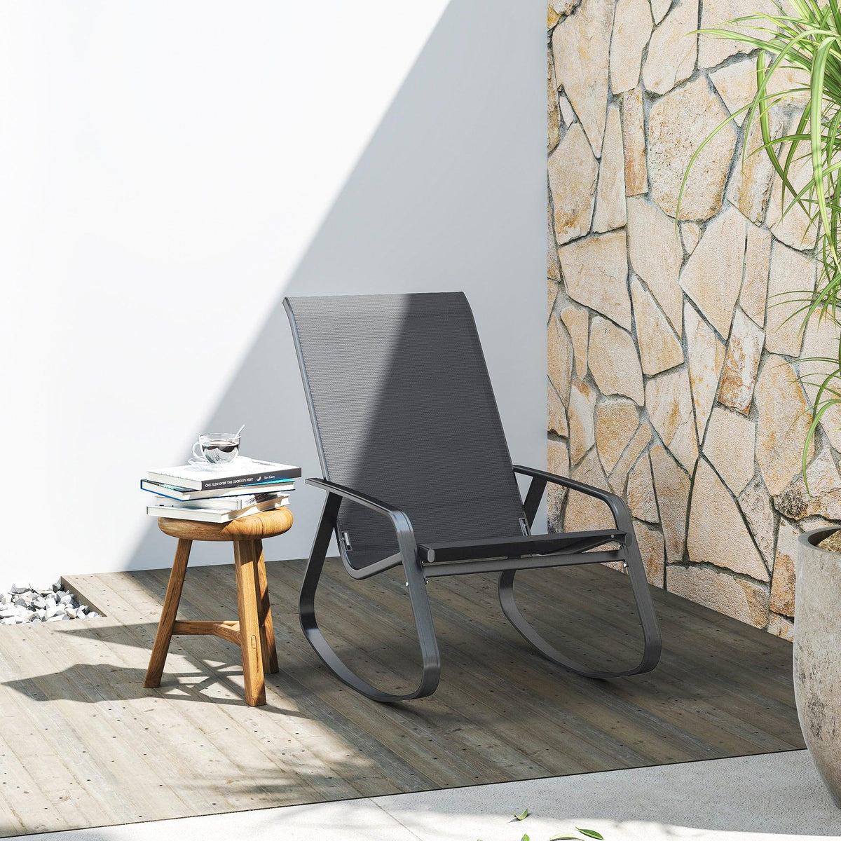 Grey mesh rocking garden chair with curved steel frame and padded armrests