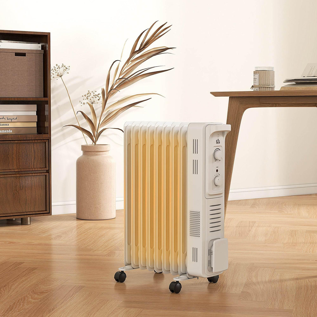 White 9-fin oil-filled radiator heater with side control panel and rolling casters