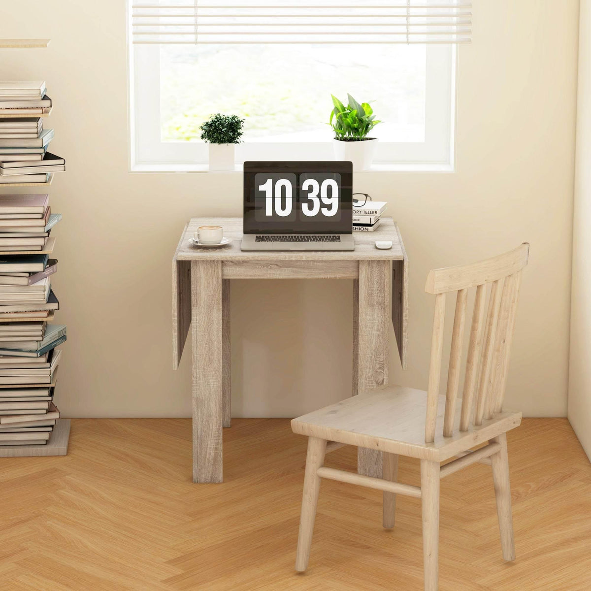 Light oak drop-leaf dining table with compact top and side leaves, styled as a work table