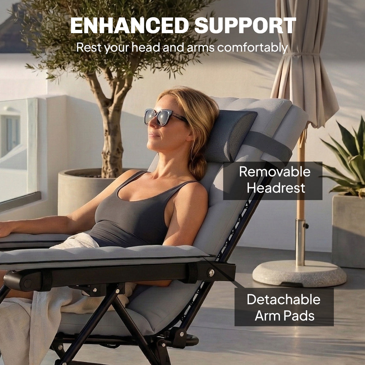 Light grey zero-gravity lounge chair with removable headrest and detachable arm pads