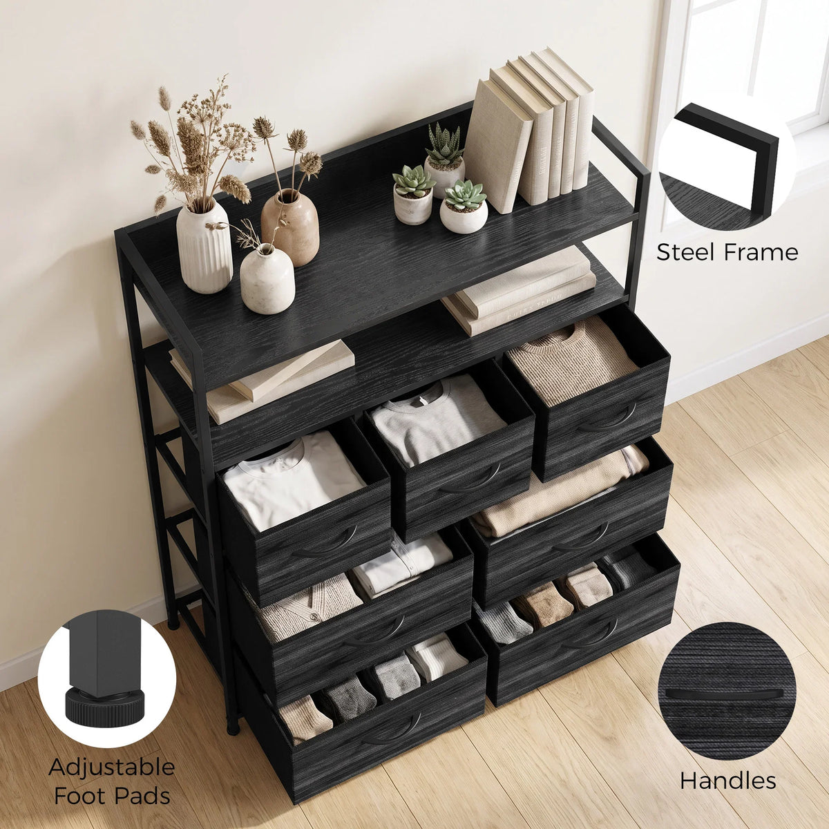 Black fabric dresser with open shelves, adjustable foot pads and drawer handles