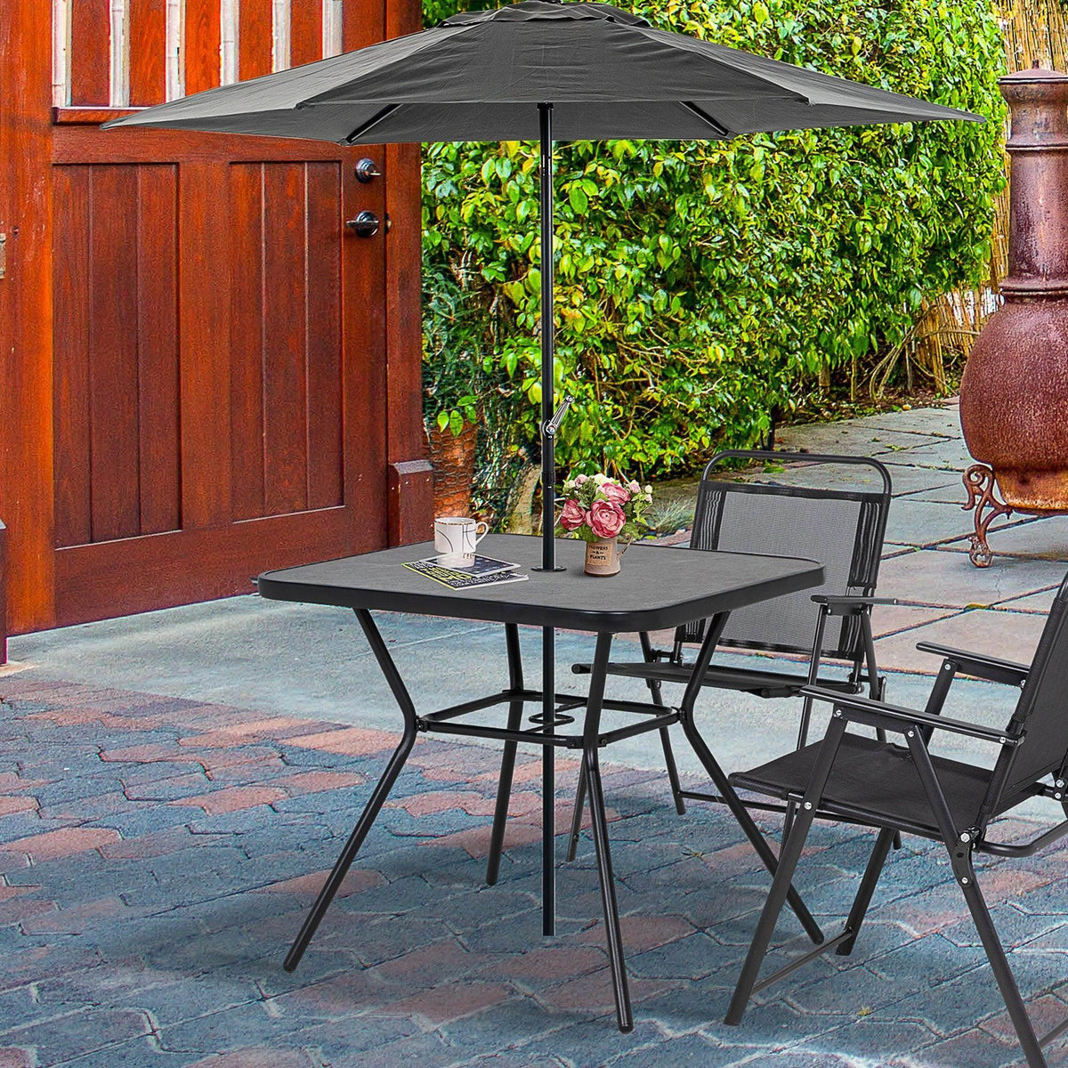 Square outdoor bistro table with dark gray faux-marble top and metal umbrella base