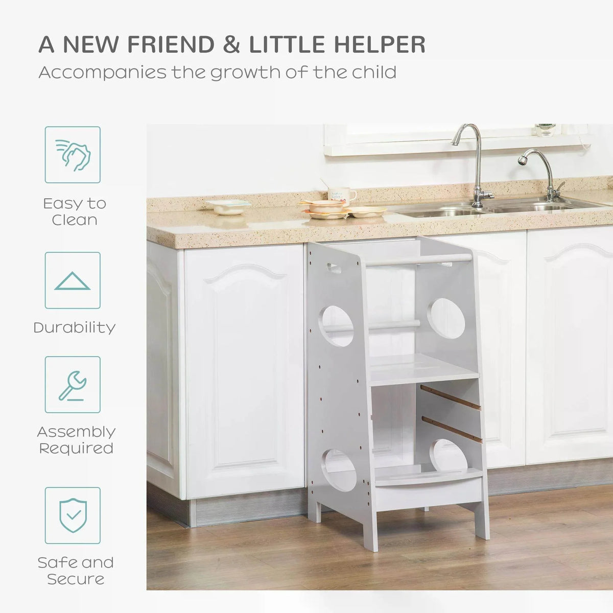 White adjustable kids step stool with safety rail in a kitchen setting