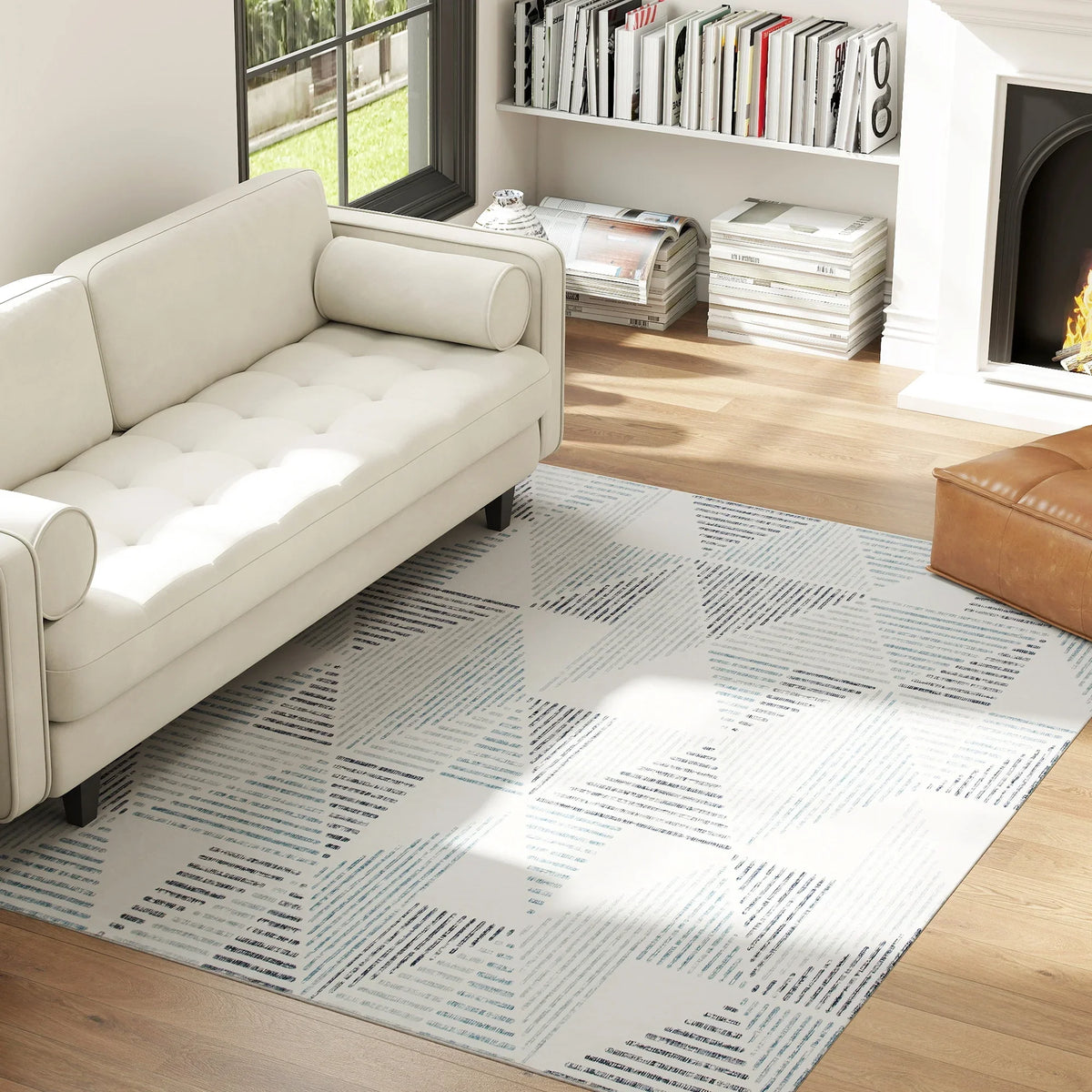 Geometric area rug with gray and blue line blocks on a light base