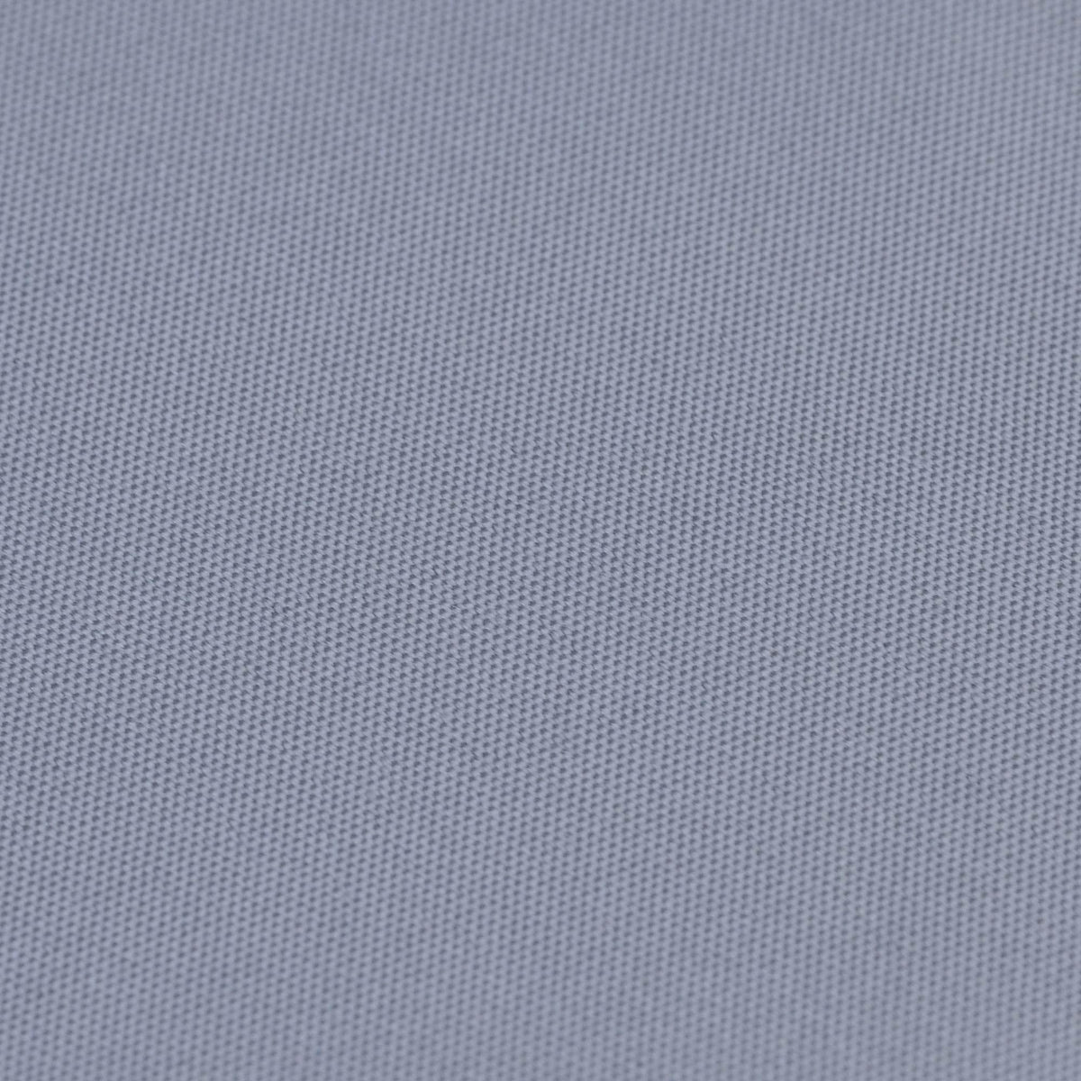Close-up of light gray cushion fabric with textured knit surface