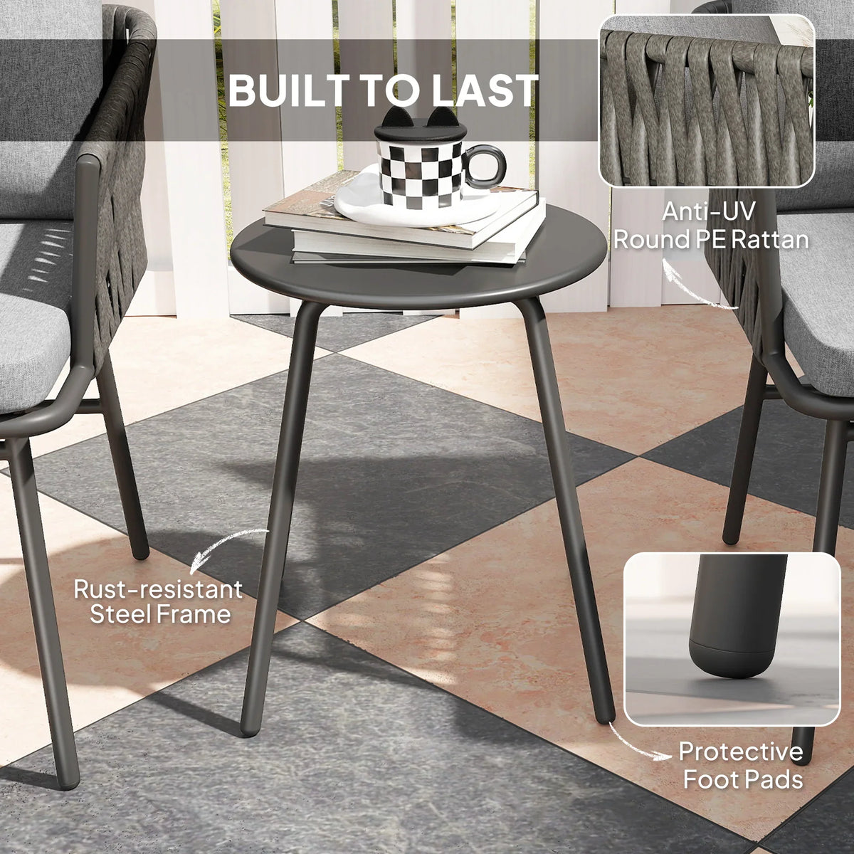 Grey rattan bistro set with round black table and two armchairs, gray seat cushions
