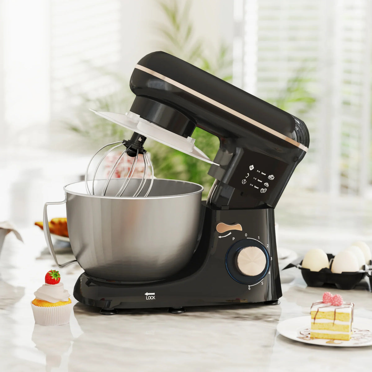 Black stand mixer with stainless steel bowl, whisk and dough hook attachments